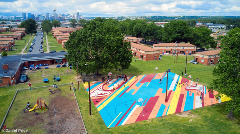 Aerial view of the colorful basketball courts at Hillside Court.