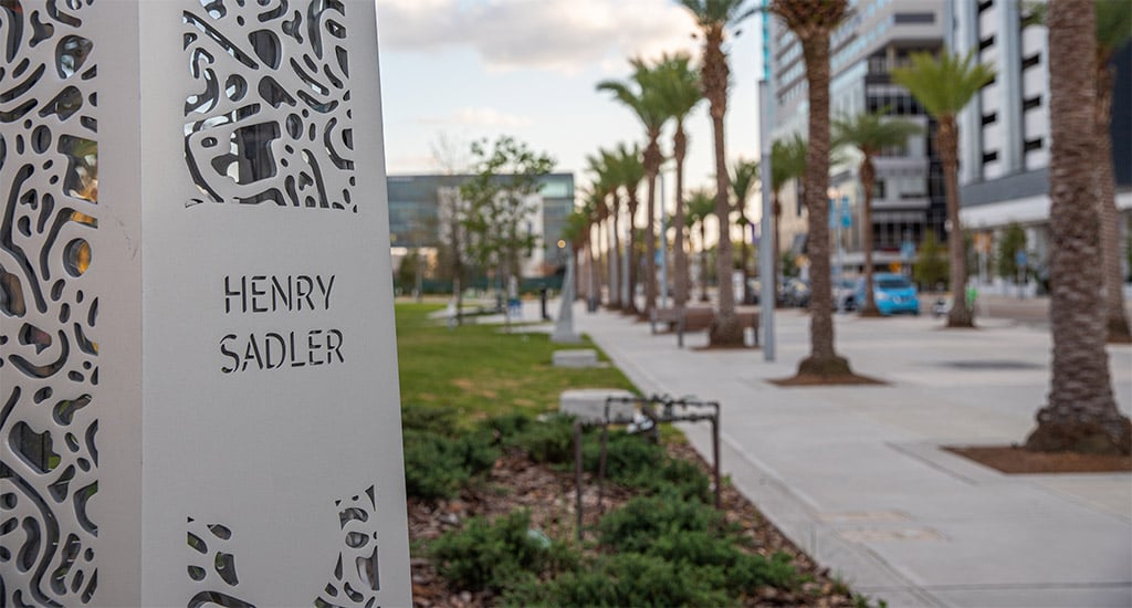 A memorial sign to Heny Sadler in Orlando’s Luminary Green.