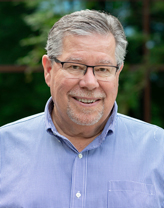 Mark Hamelin in a checkered shirt.