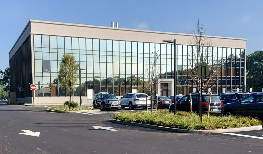 View of the new outpatient facility with landscaped parking lot and islands 