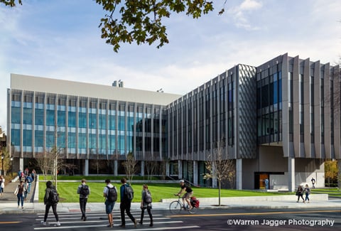 Students walk alongside the Brown University Engineering Research Center (ERC)