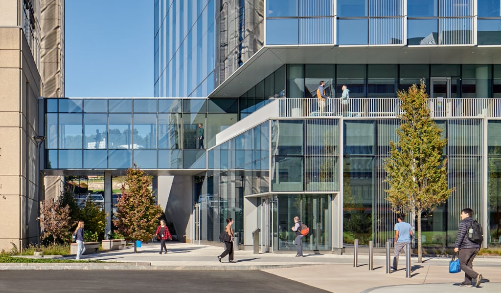 A sky bridge connecting two glass buildings.