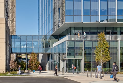 A sky bridge connecting two glass buildings.