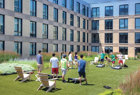 Outdoor courtyard activities at the Ink Block Development in Boston, Massachusetts.