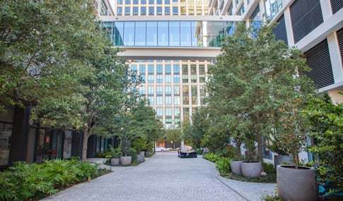 Water Street Development private alley with space for outdoor gatherings and art exhibits.