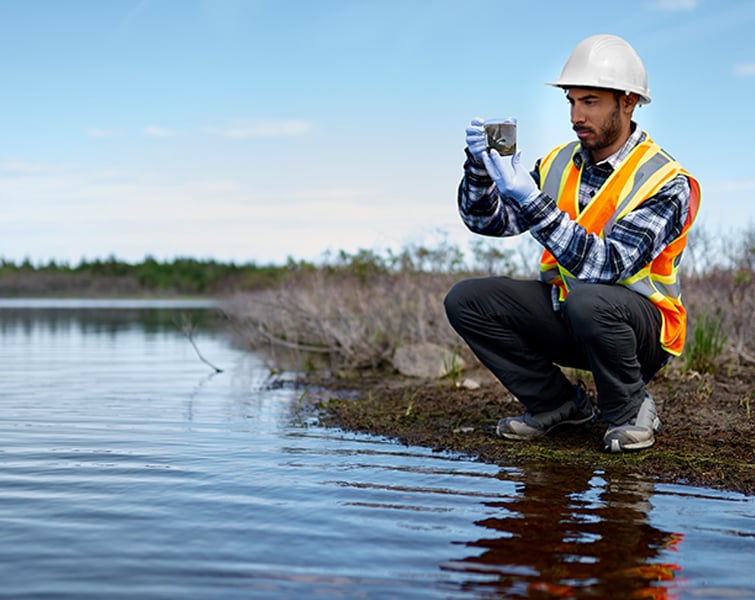 Marine biologist analyzing water test results and algea samples