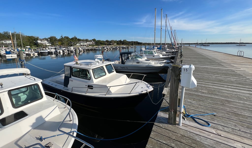 Boats docked along the Bellport Village Marina.