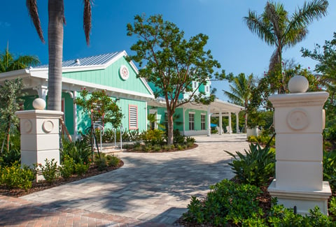 Entrance dock to the master building, lined with palm trees.