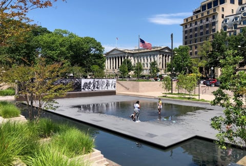 A bright sunny day at the WWI Memorial reflection pond. 