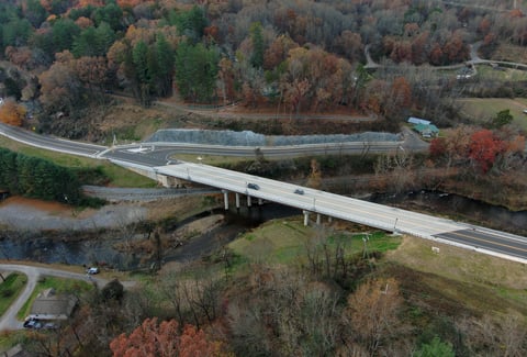Aerial view of the side of the Dillsboro Bridge replacement, including the retaining wall.