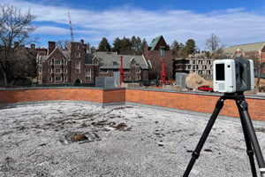 3D laser scanner on the roof of a building.