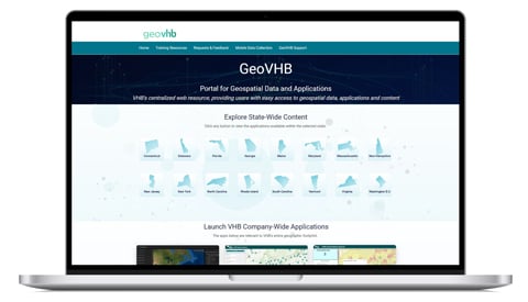 Open laptop with GeoVHB geospatial portal on the screen.