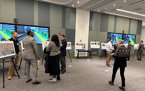 Community members gather during the L’Enfant Station Open House.