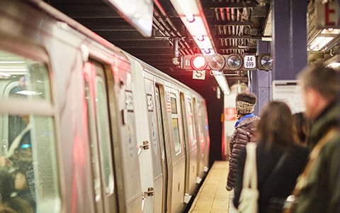 People waiting for the subway in New York City. 