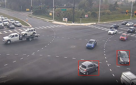 An aerial view of a near-miss detected within a roadway intersection