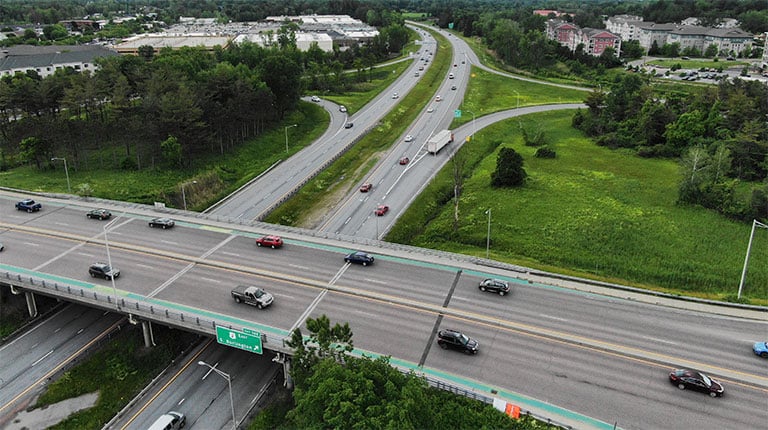 An overhead view of a freeway interchange.