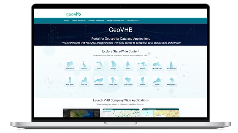 Open laptop with GeoVHB geospatial portal on the screen.