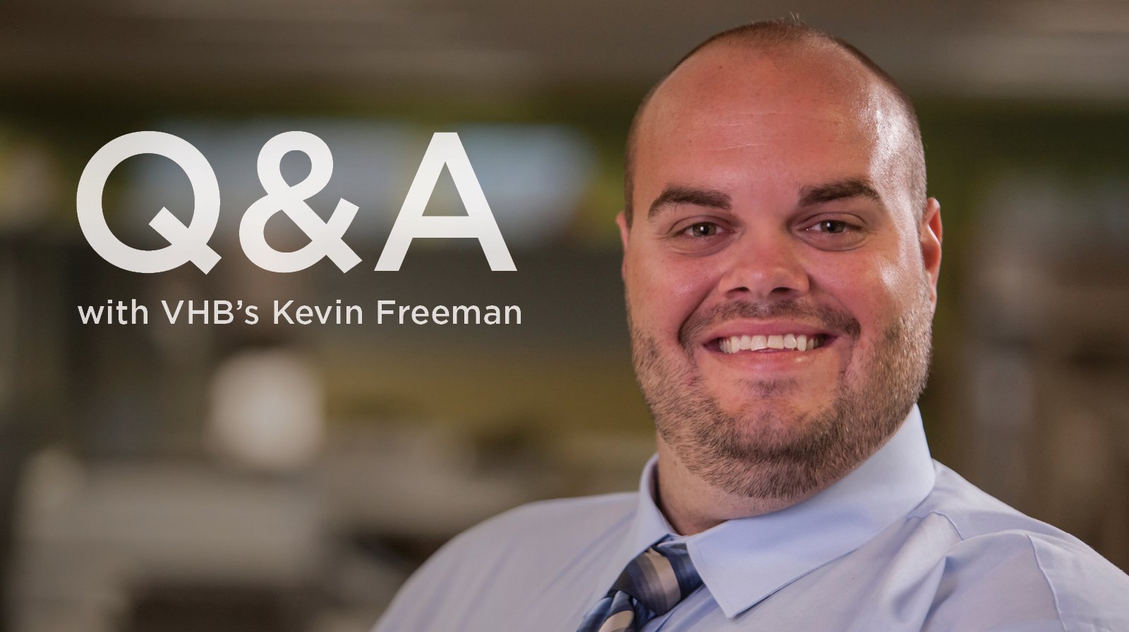 Kevin Freeman wears a tie in an office setting.