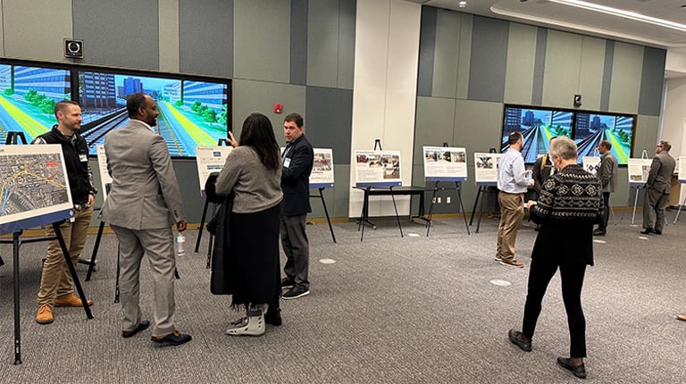 Community members gather during the L’Enfant Station Open House.