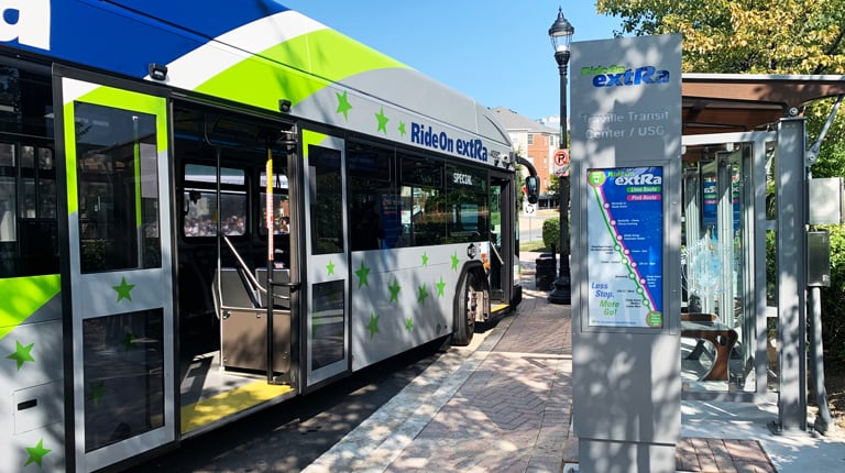 A RideOn bus parked at one of the new transit centers.