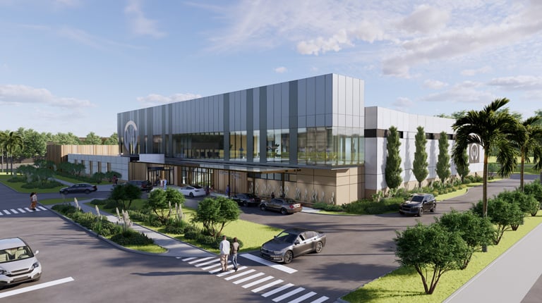 Color rendering of a two-story healthcare building with tropical plantings.