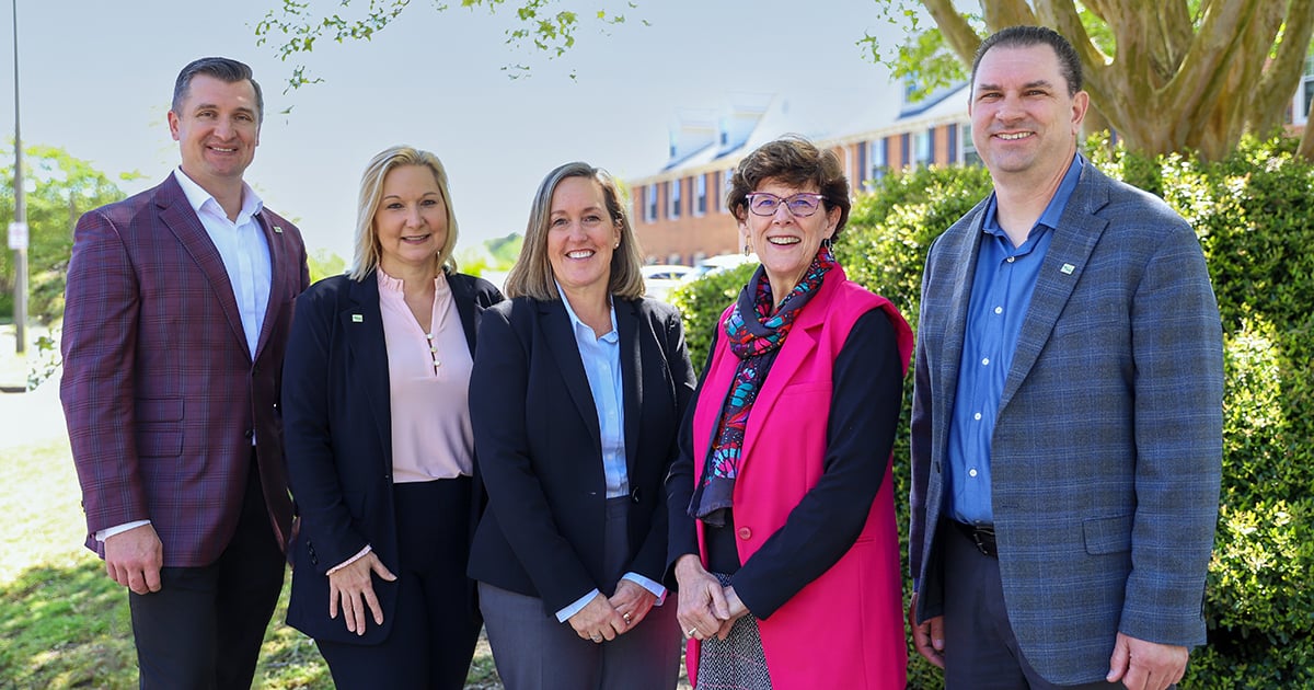 Karen McPherson (center) stands with VHB’s I-64 leadership for a group photo.