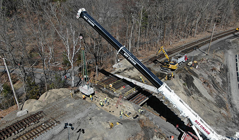 A construction crane over a bridge’