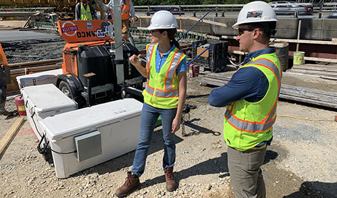 Team members at a bridge construction site