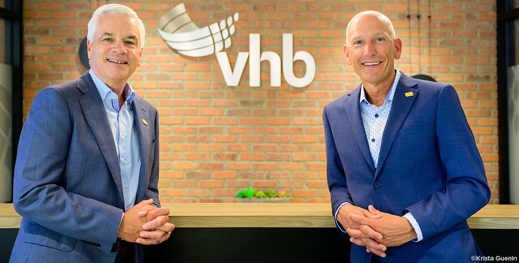 Bill Ashworth and Mike Carragher smiling at the camera.