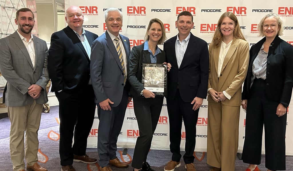 Leaders Seth Lattrell, Chris Lovett, Mike Carragher, Meredith Avery, Tom Jackmin, Kristine Zimmerman, and Elizabeth Grob accept VHB’s awards.