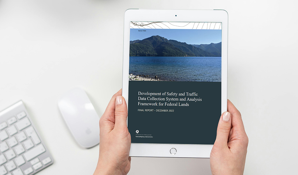 The front cover of the research report on an iPad for FHWA.