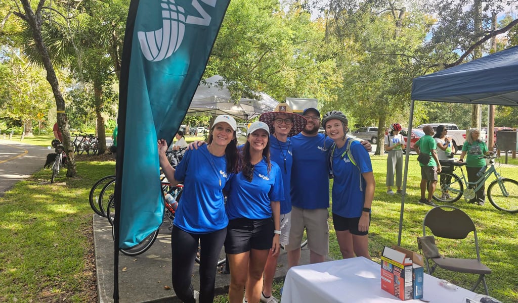 Katie and co-workers at a local bicycle event.