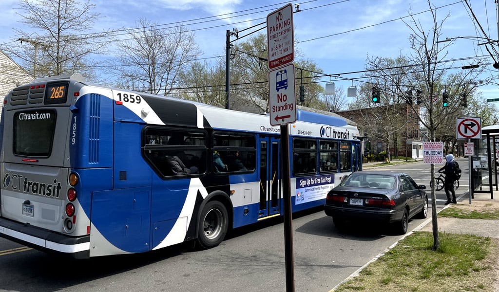 A CTtransit bus at a stop in New Haven.