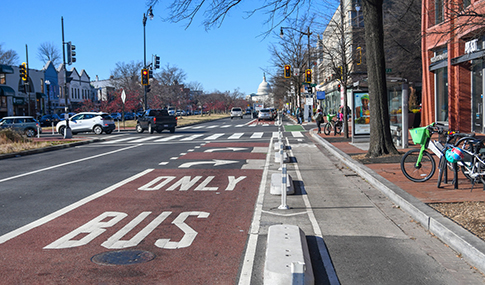 The painted bus lane and separated bike lane. 