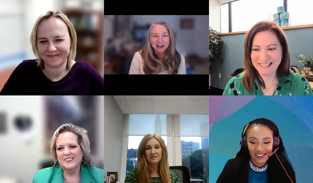 Screenshot of a virtual panel with six professional women, each in video frames, smiling and engaged in conversation. 