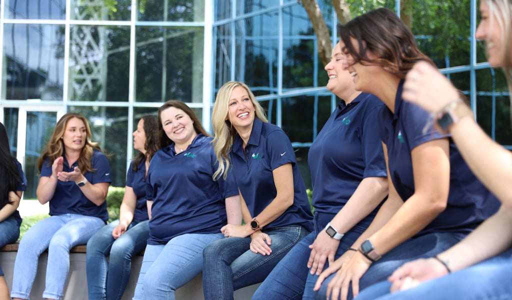 Employees from the Charlotte office engage in a Town Hall Meeting. 