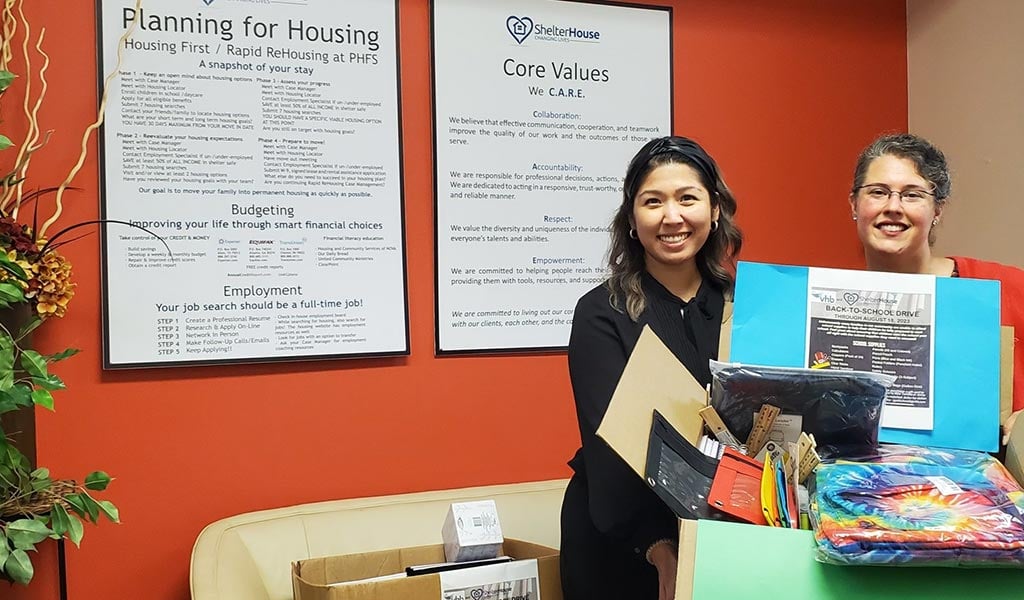 Volunteers helping with back-to-school fundraising.