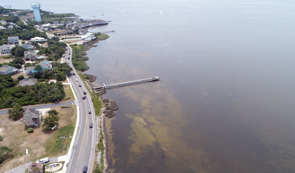 An aerial view of NC-12 along the Currituck Sound at the start of construction.