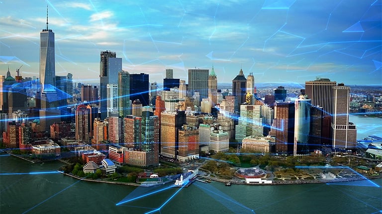 A busy city skyline and harbor with blue lines connecting buildings to represent technology.